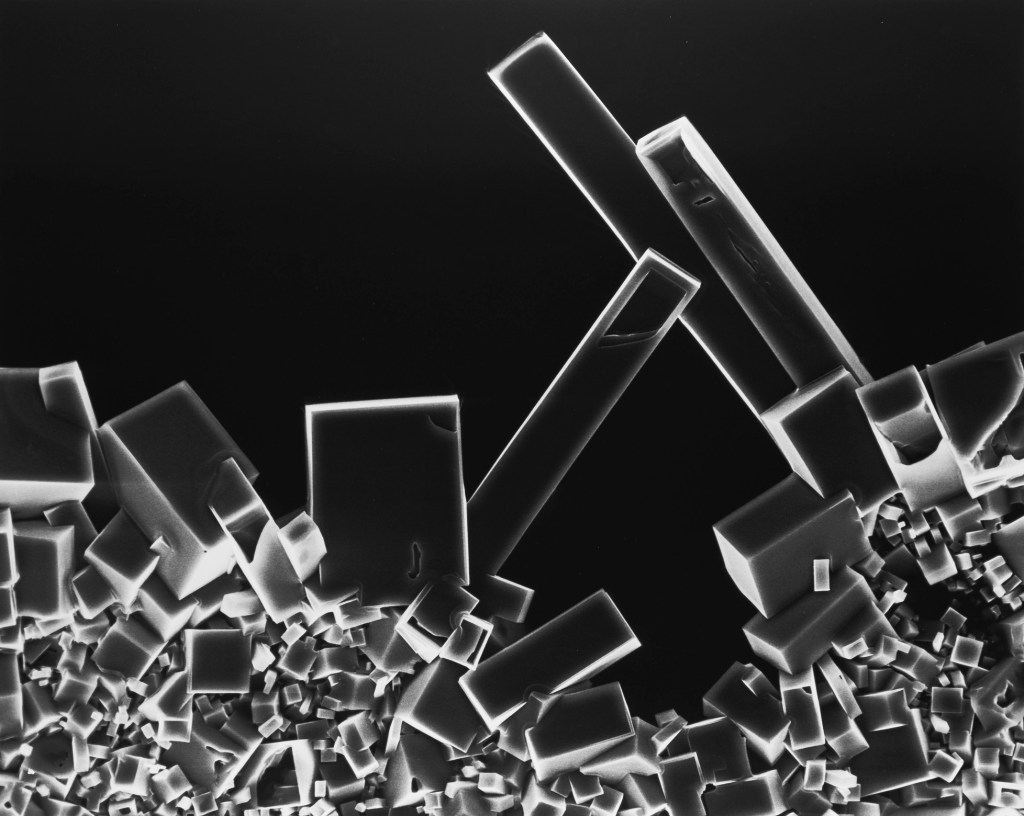 white cubes on a black backdrop