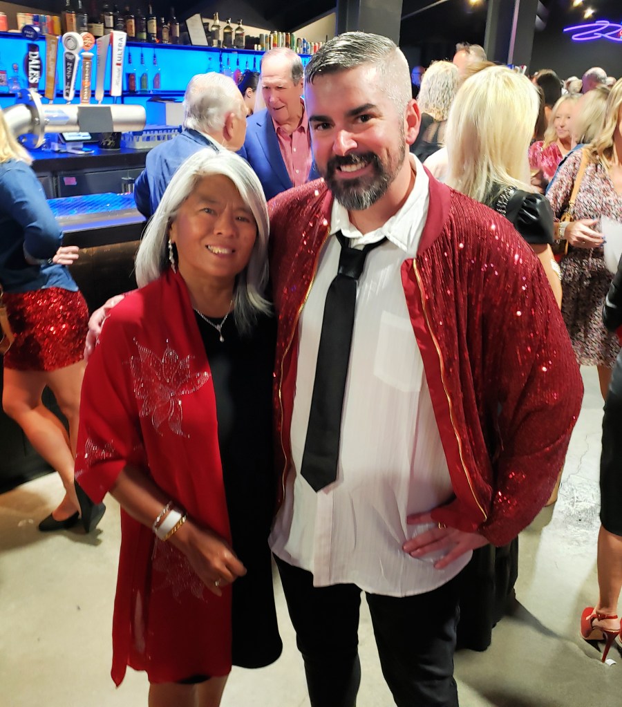Guests dressed in red at at Pepper 'Em With Love Fundraiser Gala