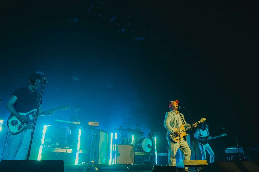 Modest Mouse performing on stage at Mission Ballroom in Denver, Colorado.