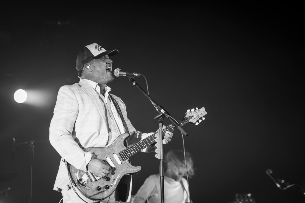 Modest Mouse performing on stage at Mission Ballroom in Denver, Colorado.