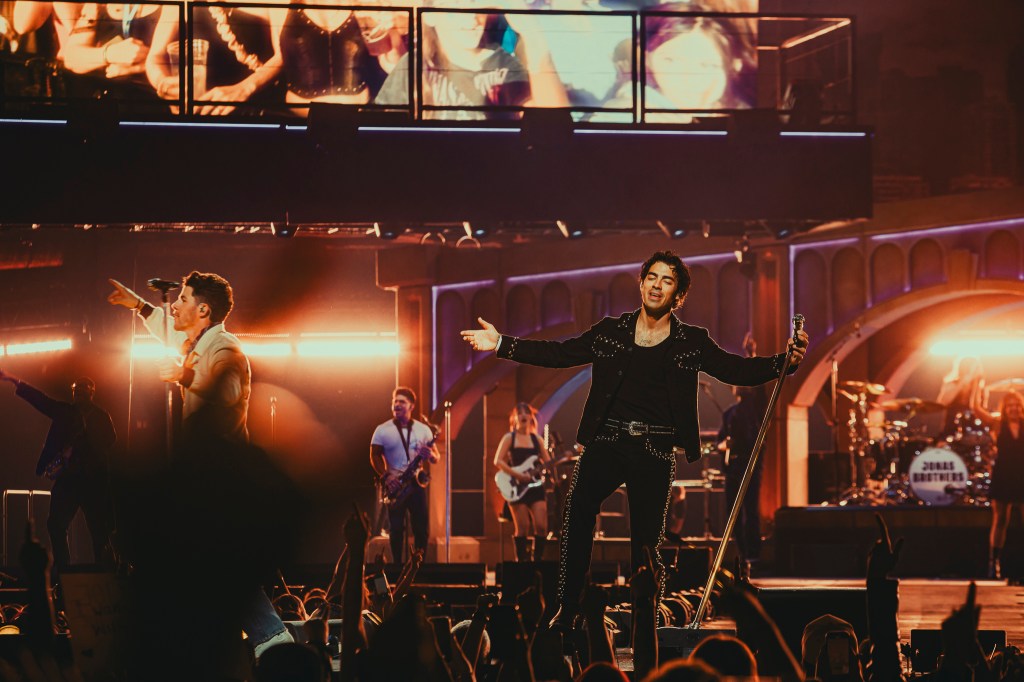 The Jonas Brothers on stage at Ball Arena in Denver, Colorado, for their JONAS20 Greetings From Your Hometown tour.