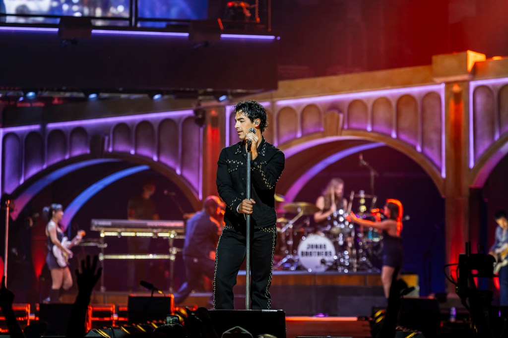 The Jonas Brothers on stage at Ball Arena in Denver, Colorado, for their JONAS20 Greetings From Your Hometown tour.