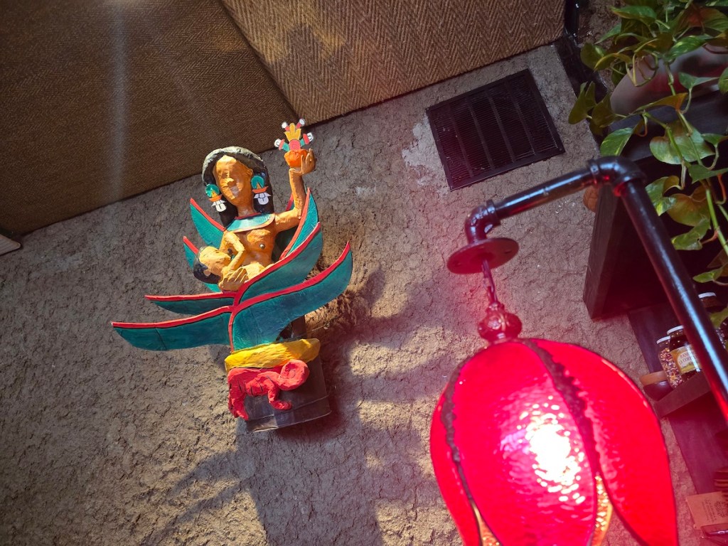 colorful statue on a wall