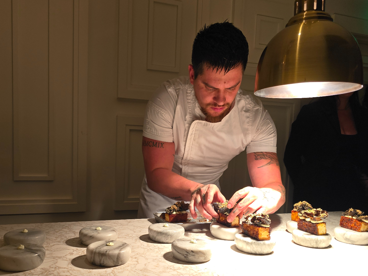 a chef plating dishes