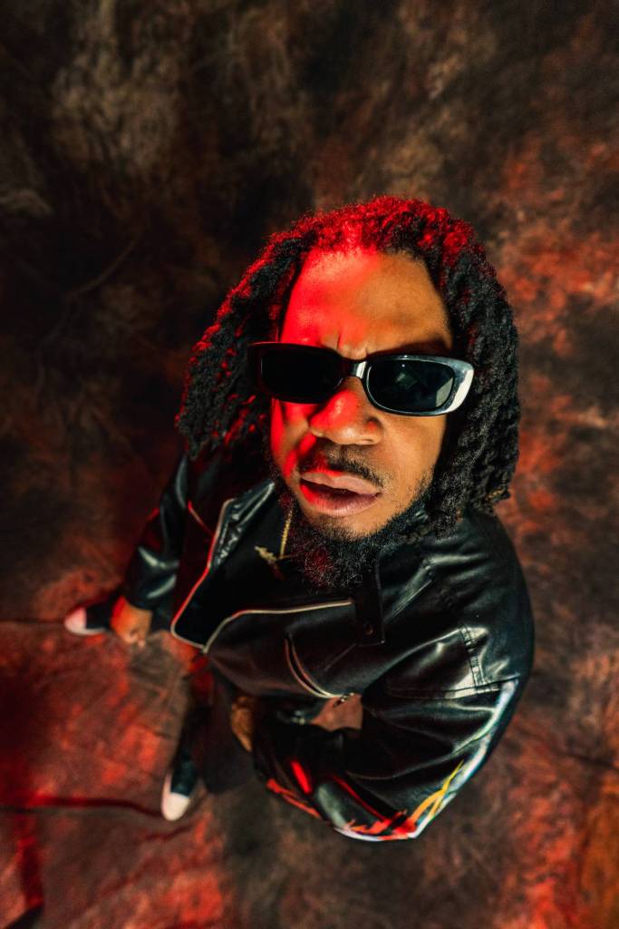 DNA Picasso wearing sunglasses