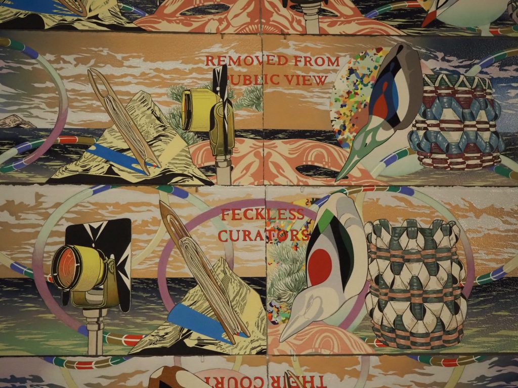 A colorful artwork reading "removed from public view" and "feckless curators"