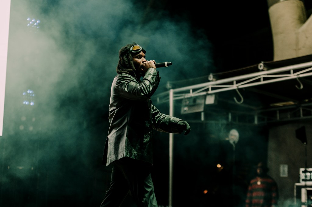 A photo showing Denzel Curry on stage at Red Rocks on October 31 for Halloween on the Rocks.