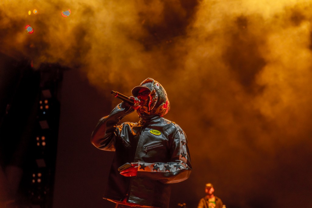 Earl Sweatshirt on stage at Red Rocks on October 31 for Halloween on the Rocks.
