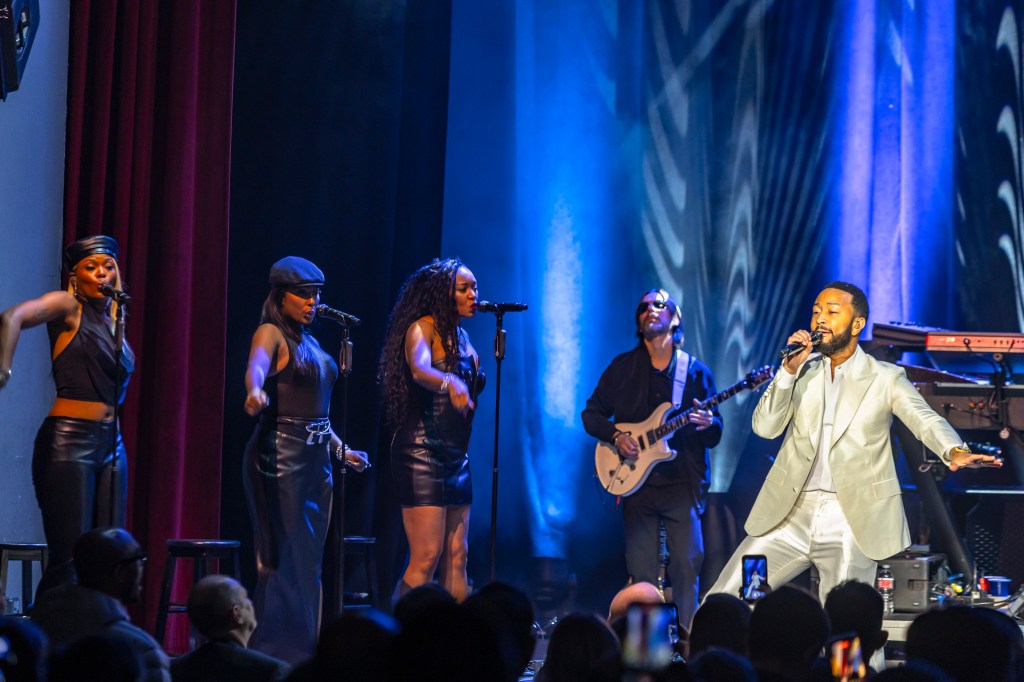 John Legend performing on stage at the Paramount Theatre on Wednesday, November 19.