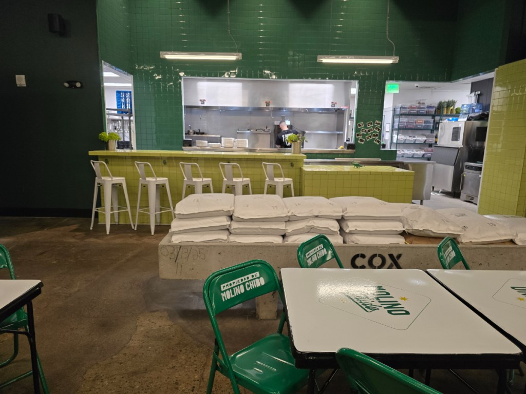 green folding chairs inside a restaurant