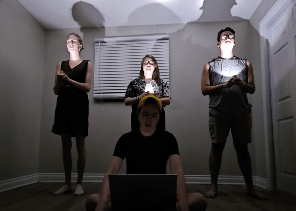 Actors practice a scene.