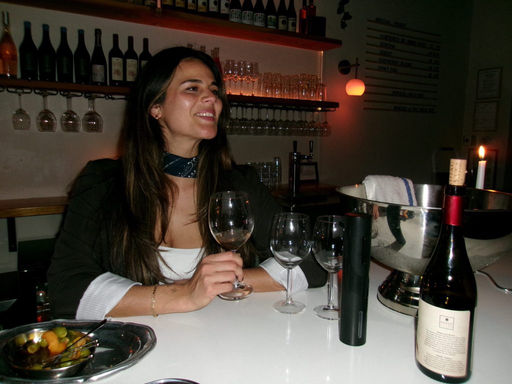 a woman drinking wine