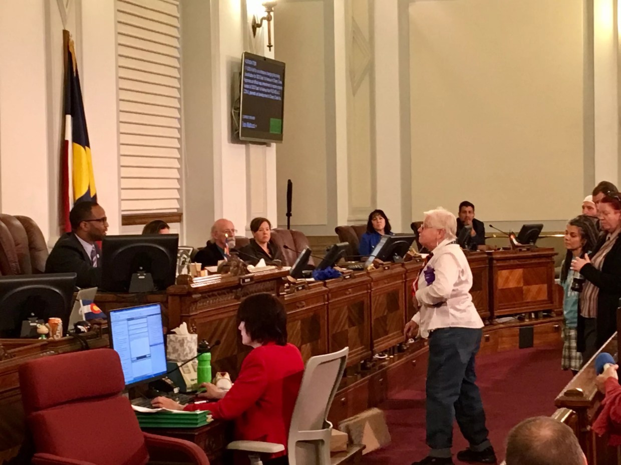 Activists Disrupt City Council Meeting to Deliver Petition to End Camping Ban