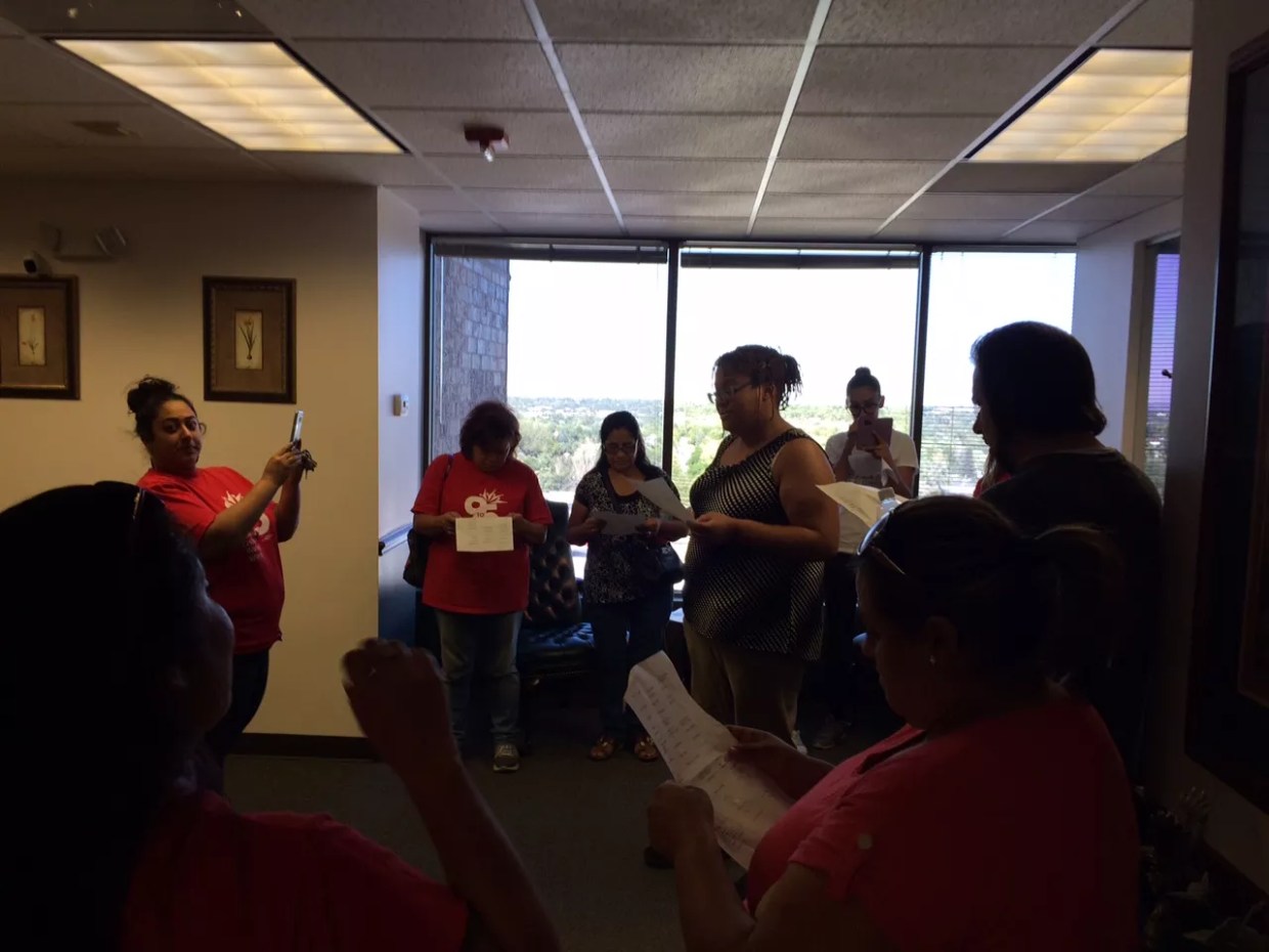 Housing Activists Stage Mock Eviction at Office of Major Law Firm