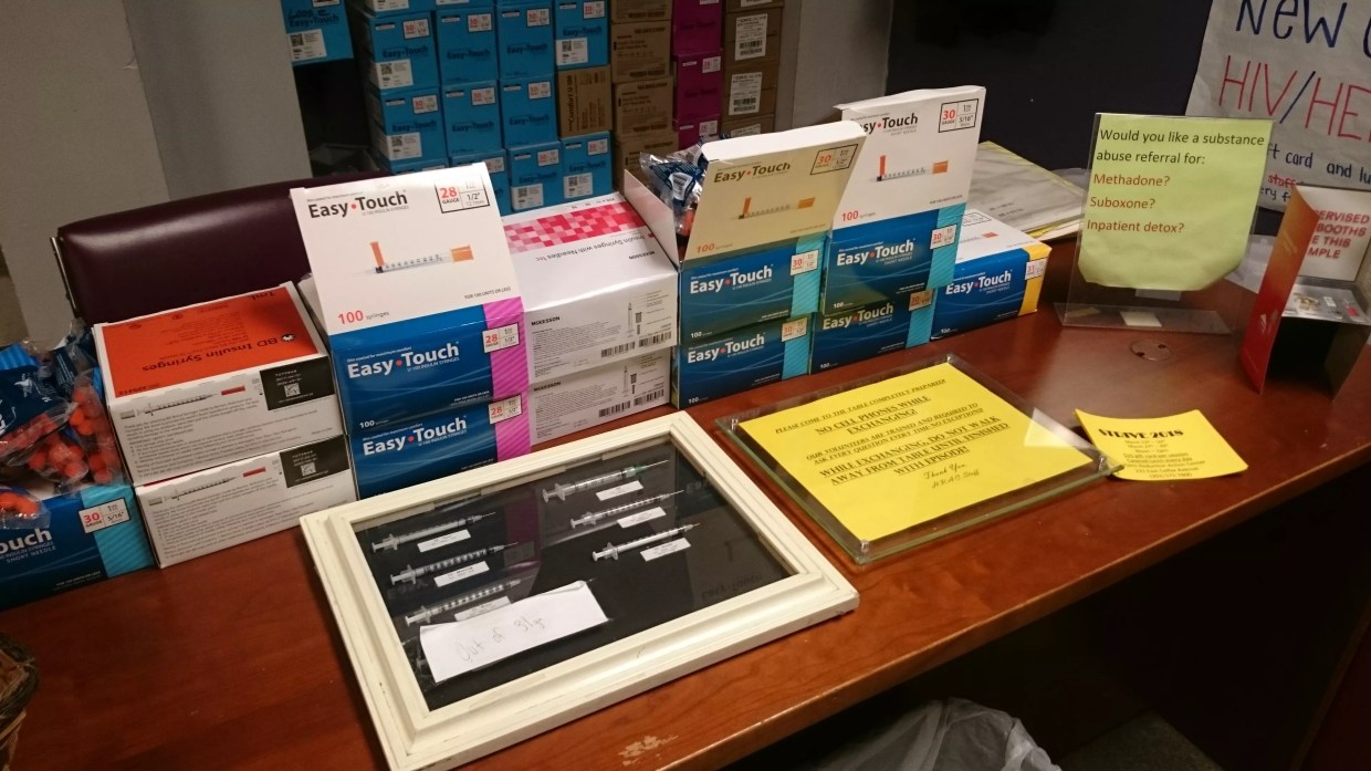 Free needles displayed on a table for clients of the Harm Reduction Action Center