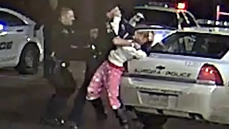 Aurora Pays $335K in Police Stomping Case but Admits No Wrongdoing