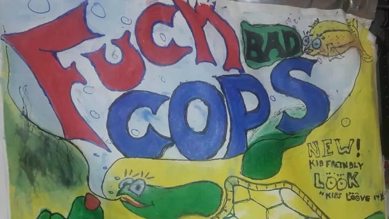 Claim: Cop Tased “F*ck Bad Cops” Protester After He Tripped Himself