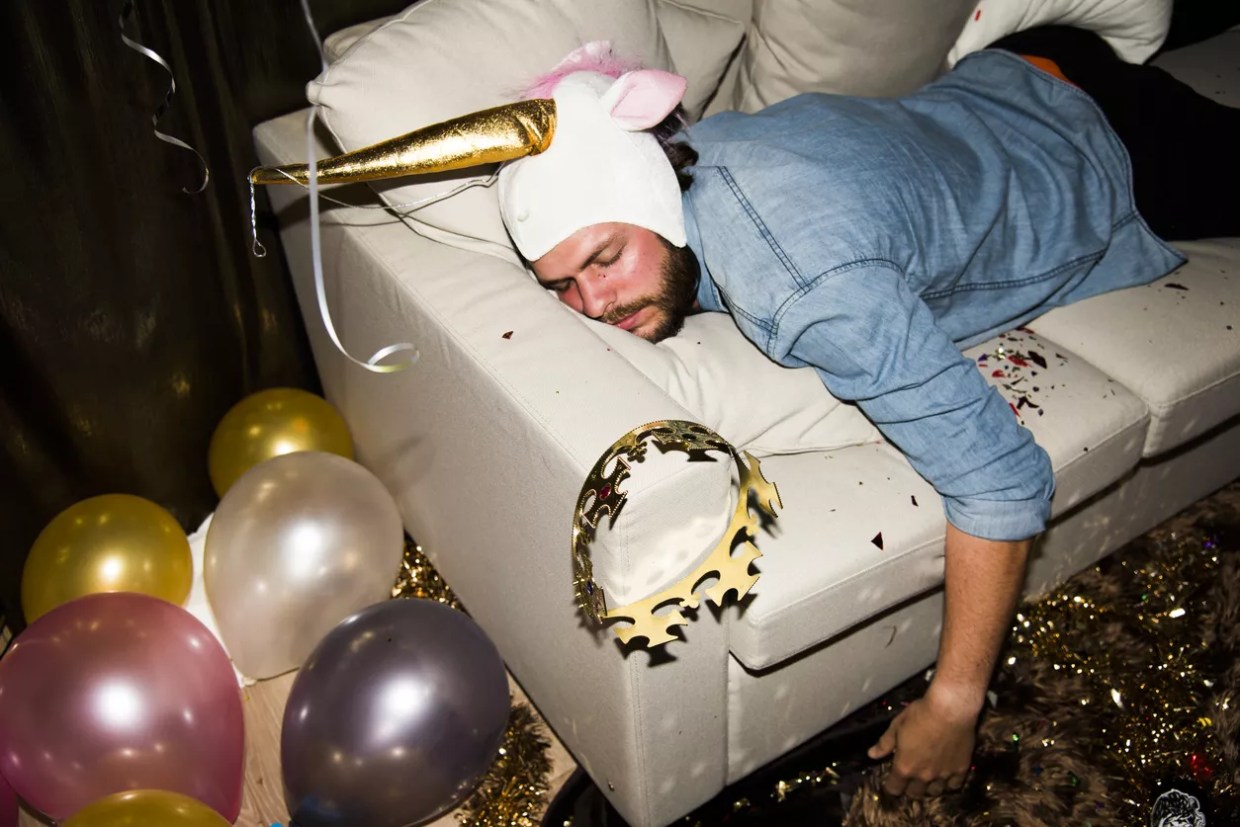 Man passed out on couch after night of partying