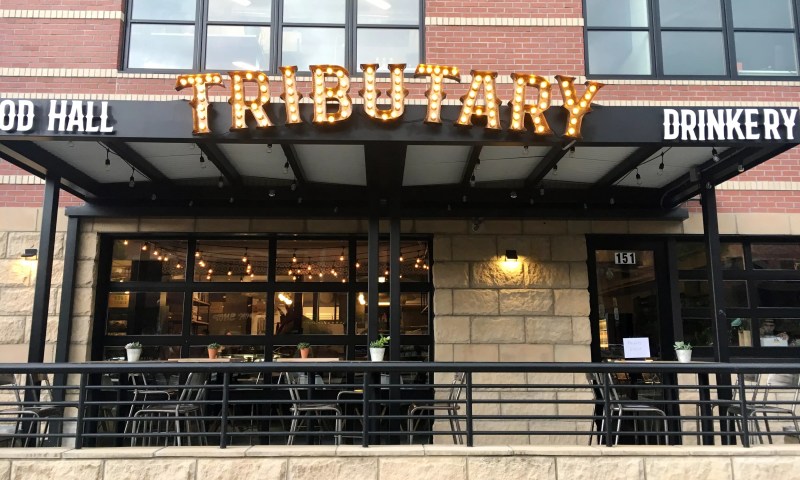 sign hanging over a building