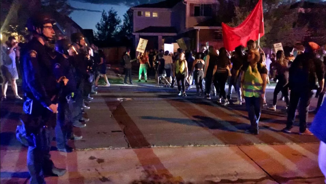 Hundreds of Protesters Rally Outside Home of GEO Facility Warden