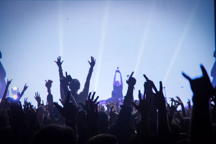 fans in a music venue