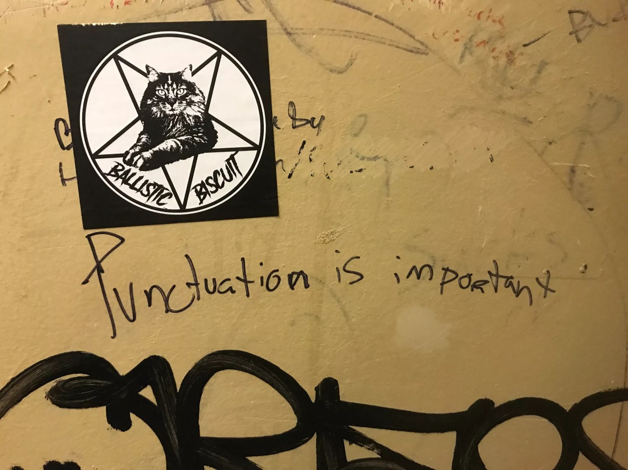 Denver Bathroom Graffiti Reminds Us: “Punctuation Is Important”