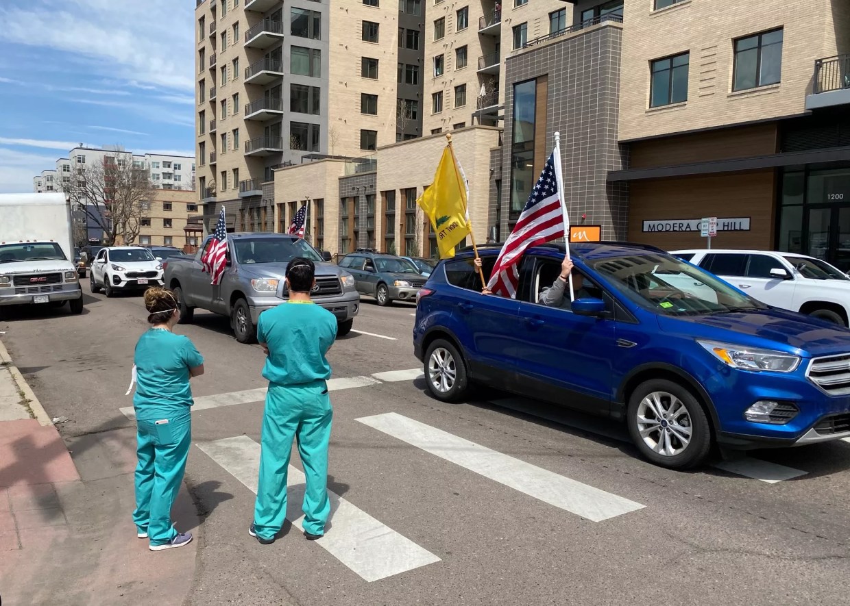 Health-Care Workers Face Off Against Anti-Shutdown Protesters