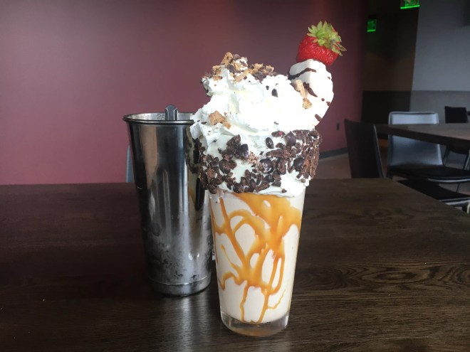 milkshake with whipped cream and strawberries