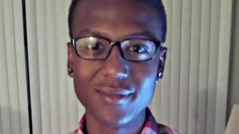 young black man in glasses