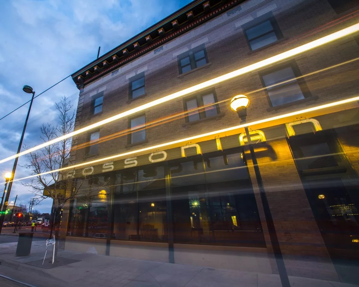 old hotel with neon in Denver