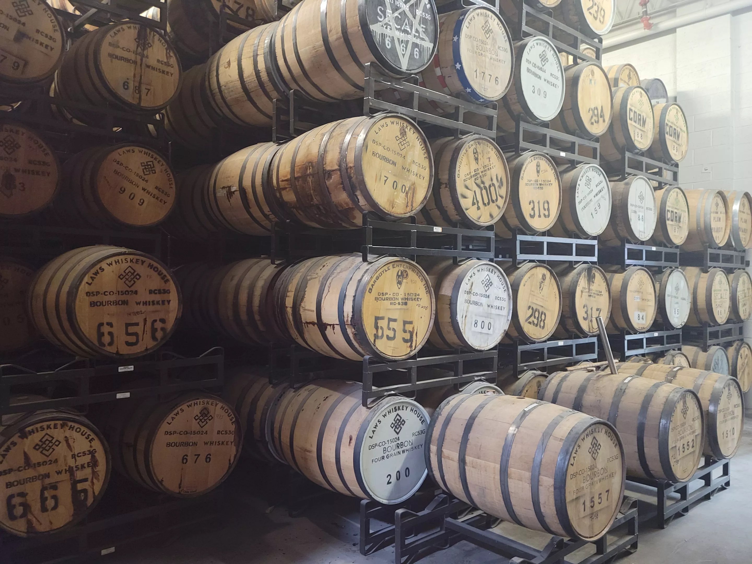 barrels on racks in a distillery