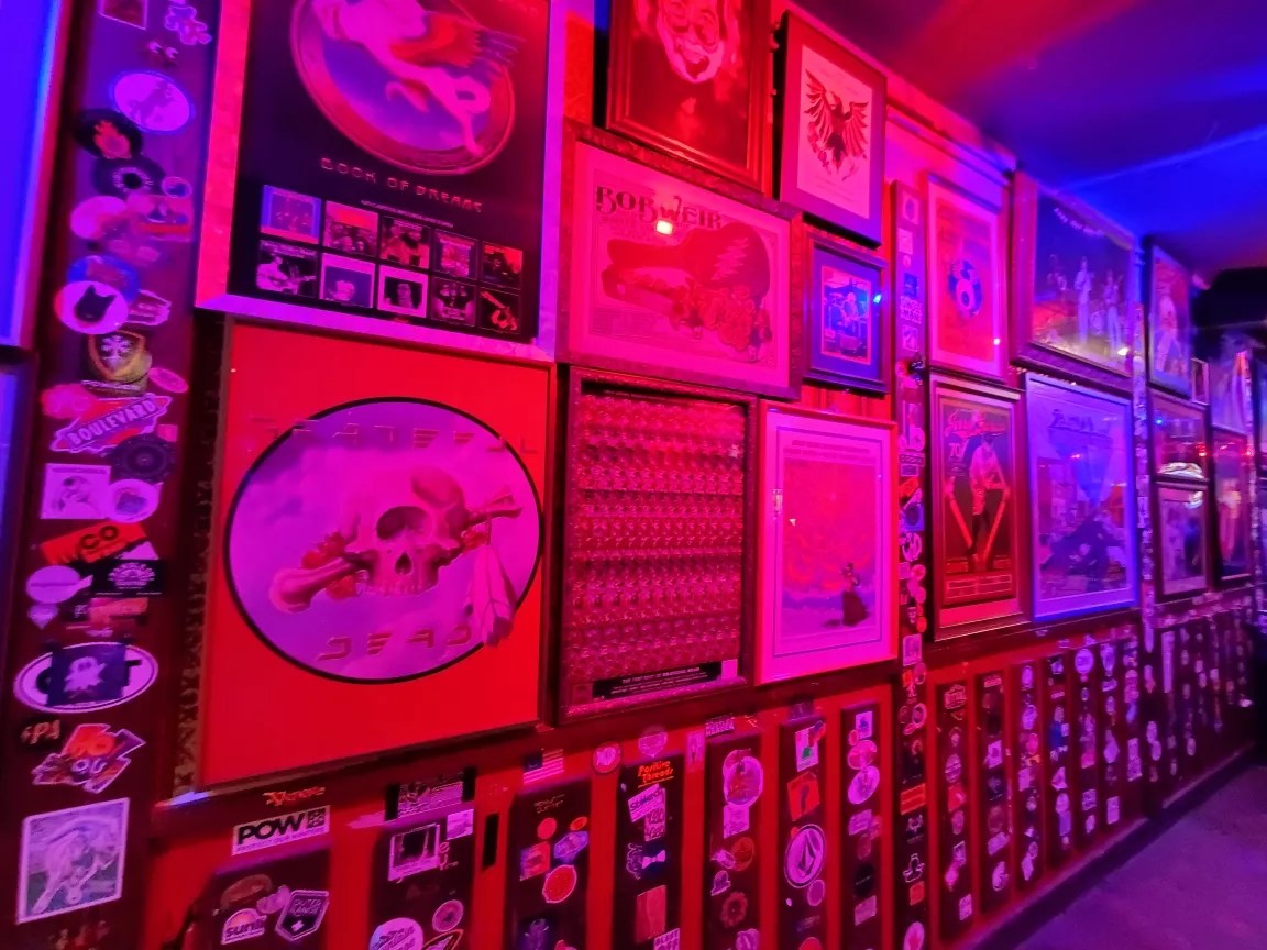 framed memorabilia hanging on a wall