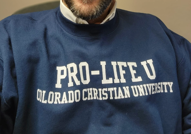 Man wears pro life u sweatshirt