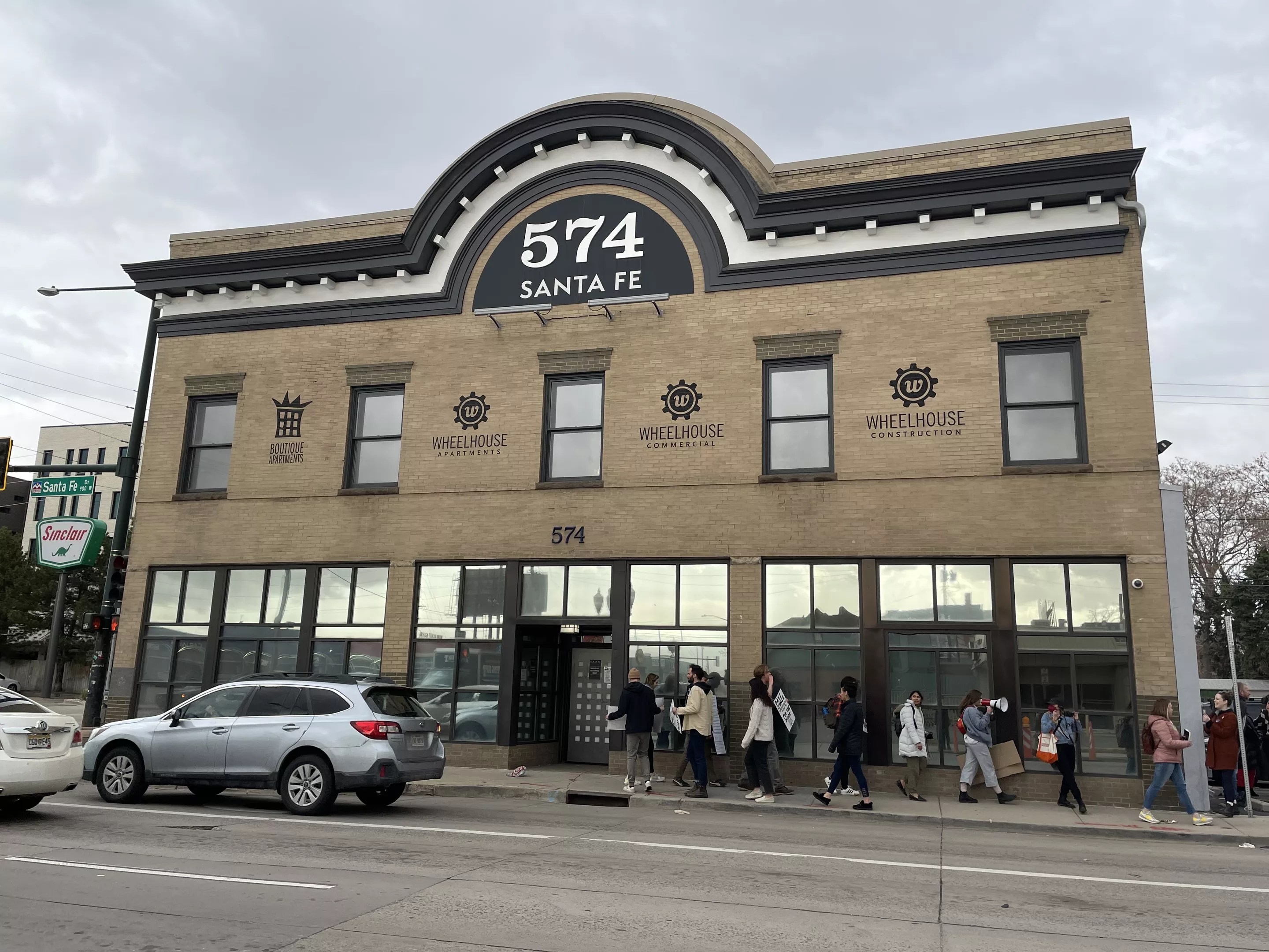 The Clarkson tenants picketing in front of Boutique Apartments in Denver, Colorado, on April 19.