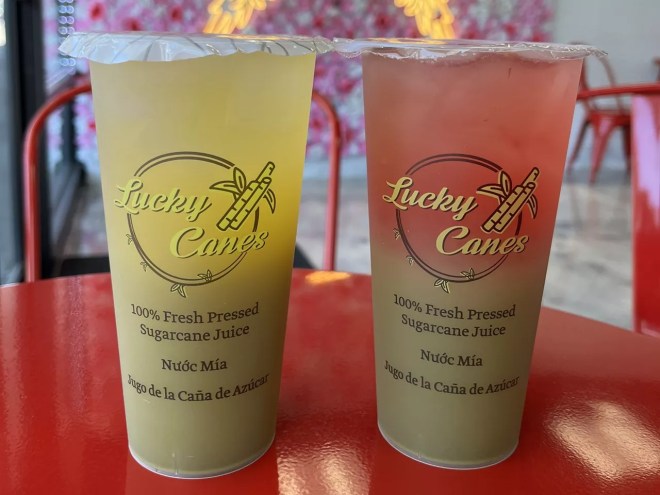 Two drinks with the Lucky Canes logo.