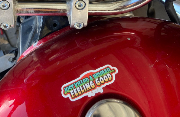 "Just Killed a Woman" sticker on motorcycle closeup