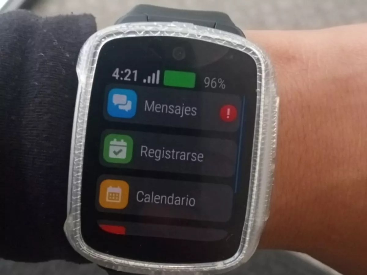 A watch device on someone's wrist.