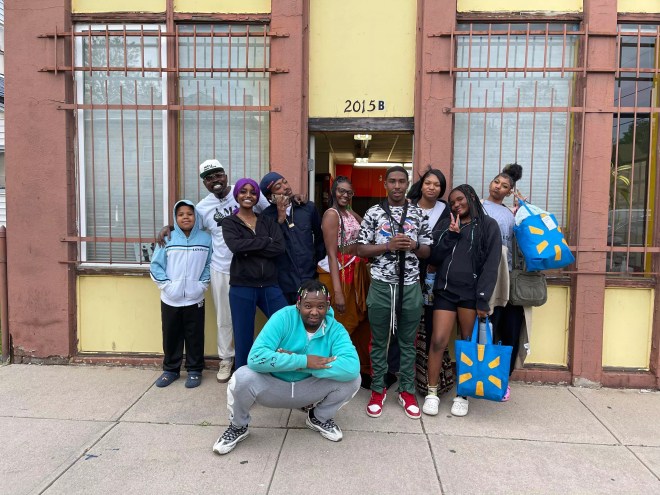 Youth and staff outside the Make a Chess Move main office in East Denver.