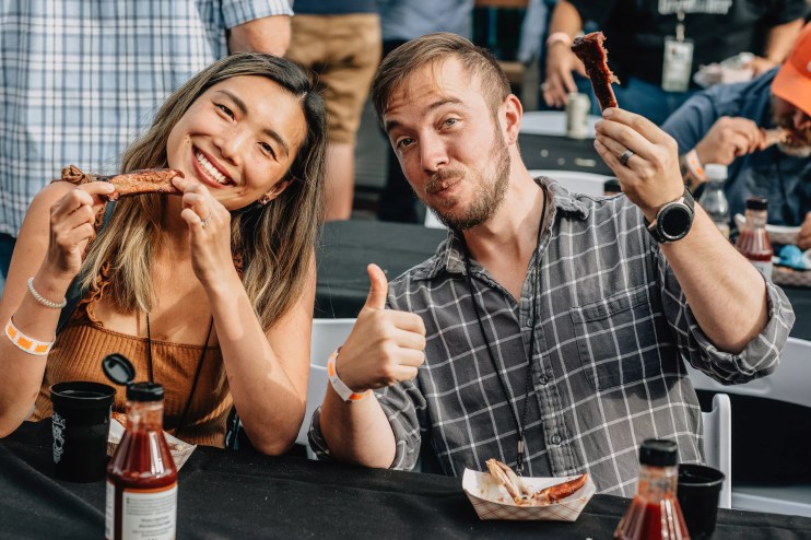 couple eating barbecue.