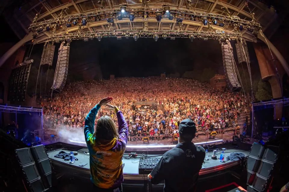 two djs play for a crowd