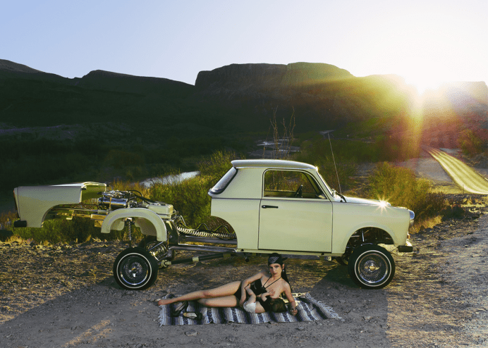 Liz Cohen's "Lowrider Builder and Child."