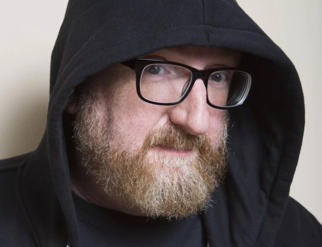 man with beard in hood