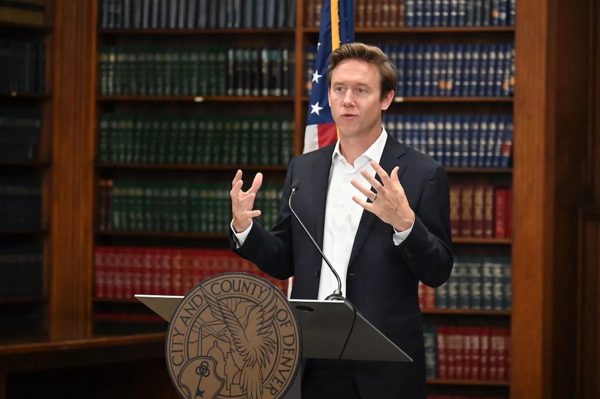 Denver Mayor Mike Johnston talks to the press about a planned homeless sweep in the Parr-Widener Room.
