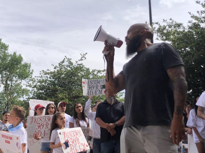 Alexander Landau leads a protest on August 11.