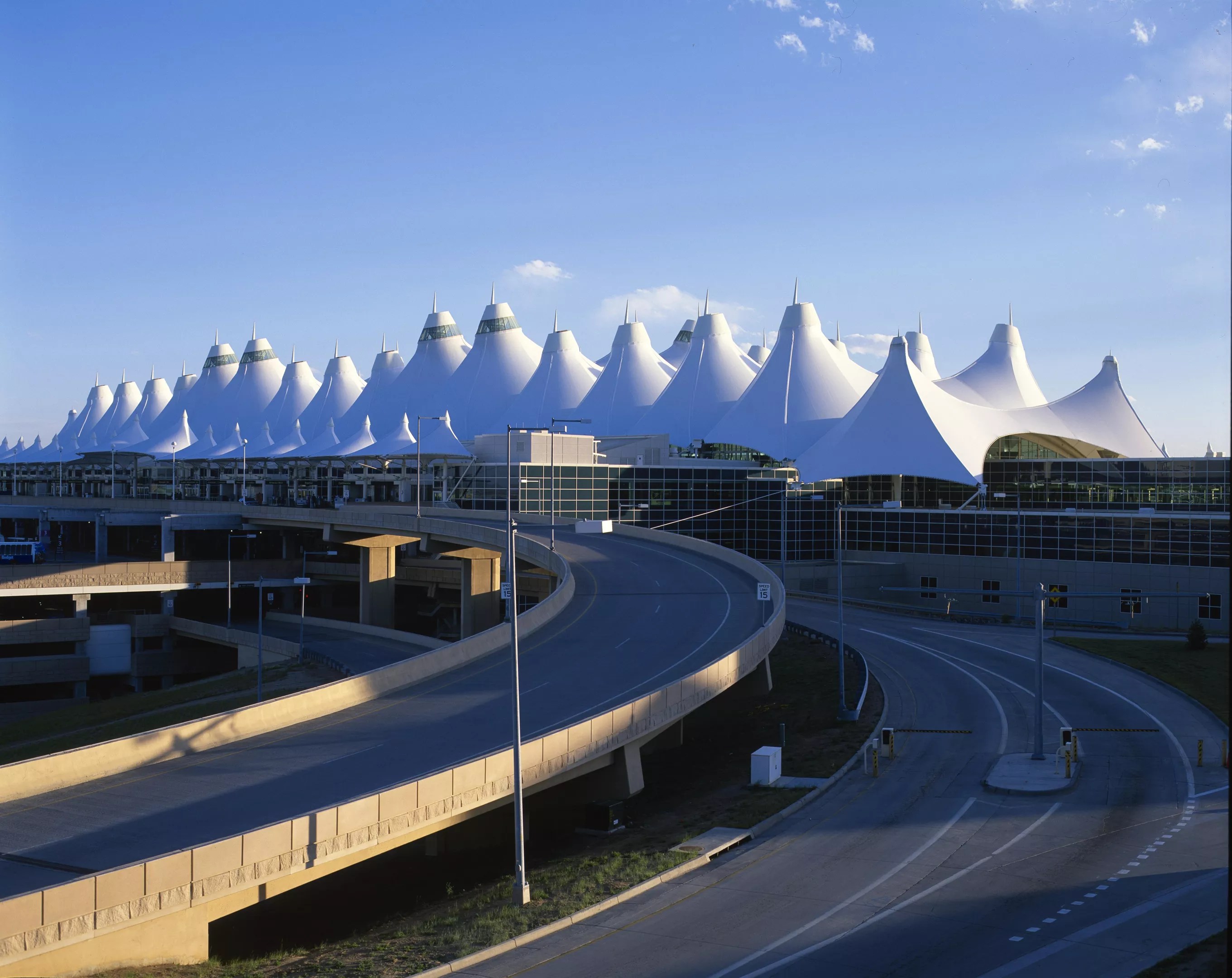 denver airport with tents and blue sky