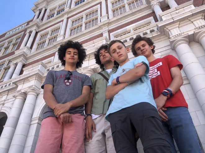 From left: Beckett Nelson-Gardner, Caden Fiala, Seth Shurz and Noah Shurz standing in front of East High School.