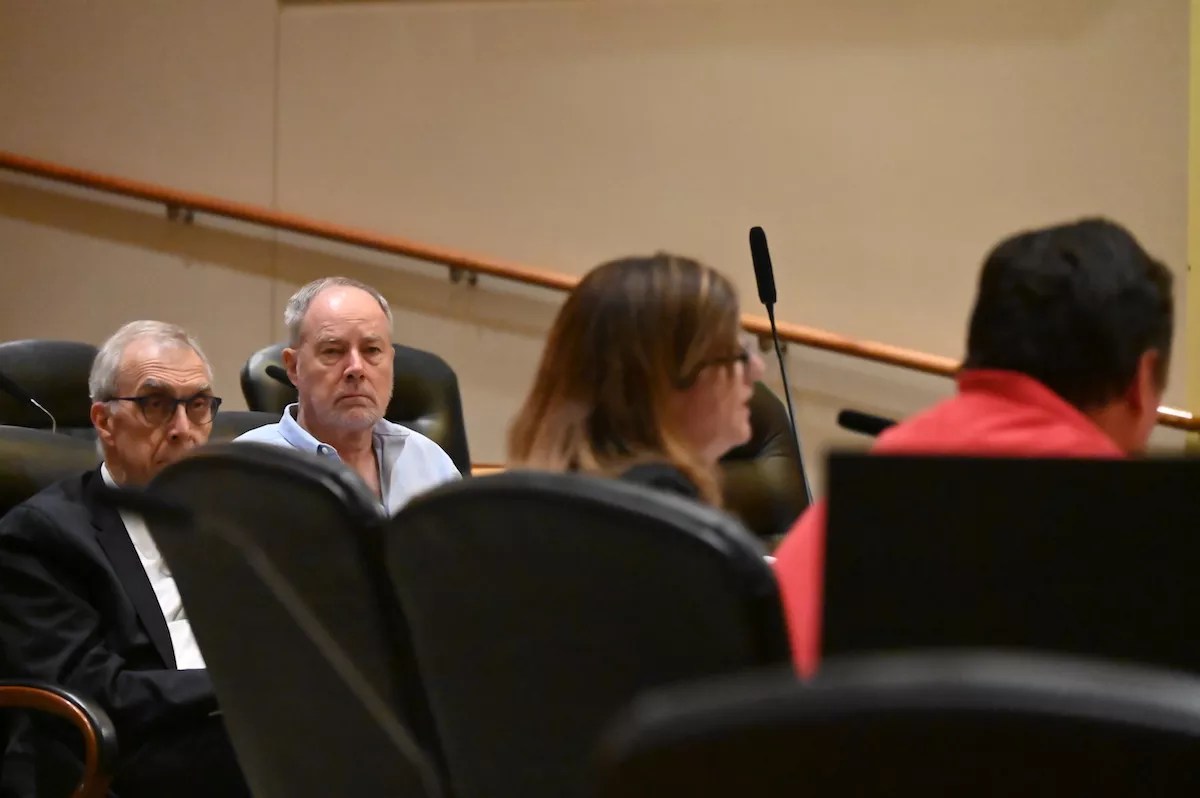 Charlie Richardson, Mark Grueskin and Suzanne Tehari in the Aurora City Council chambers.