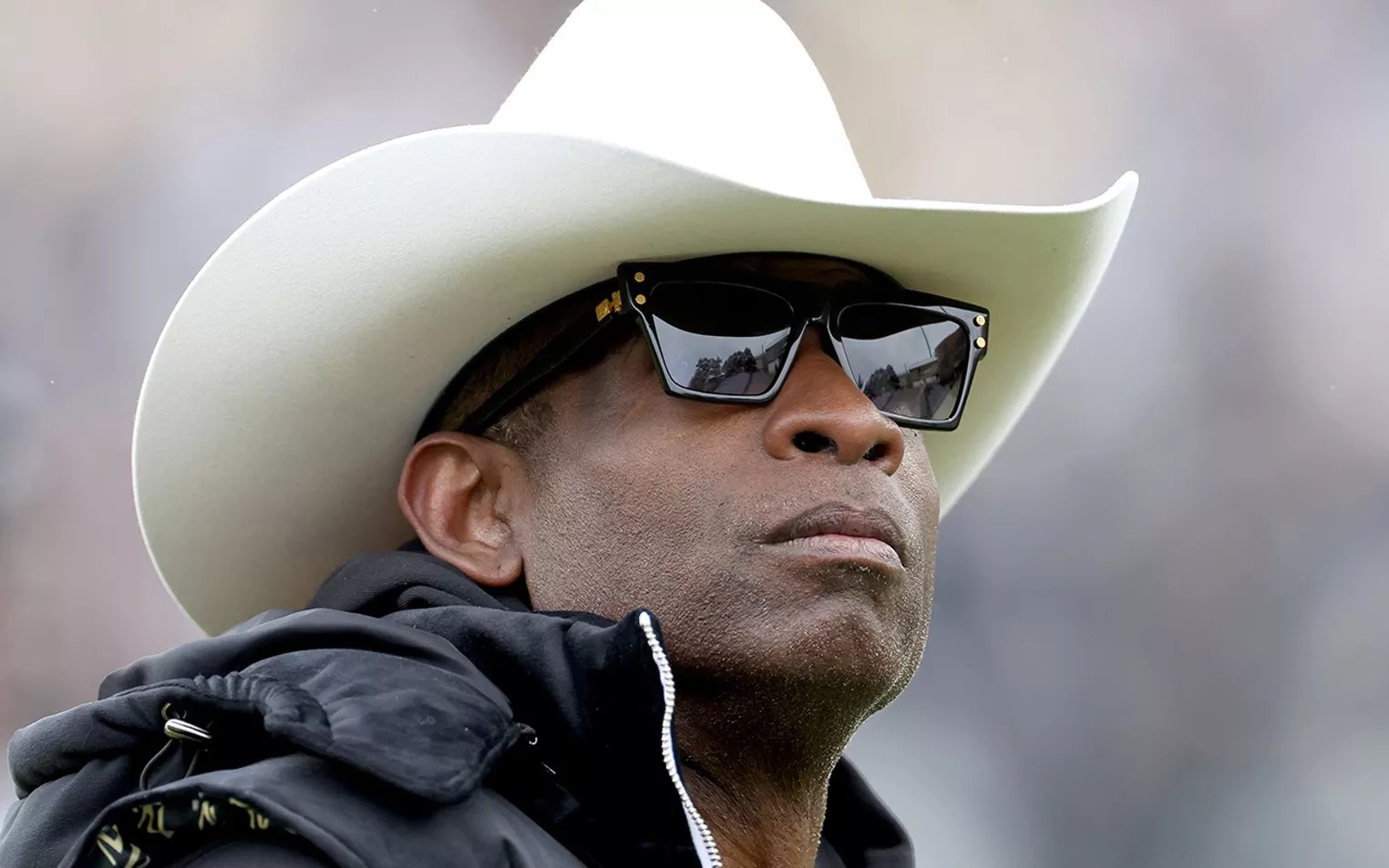 black man in sunglasses and cowboy hat