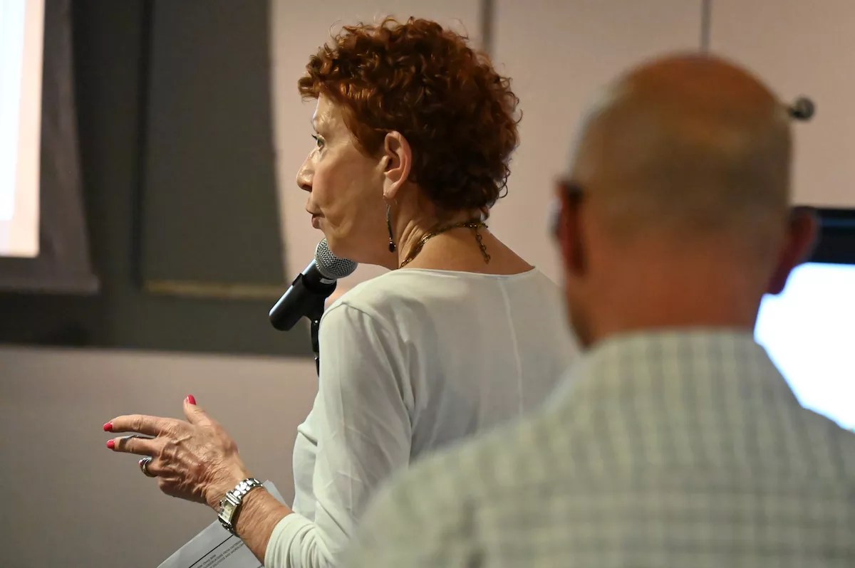 A Golden Triangle resident speaks at a community meeting.