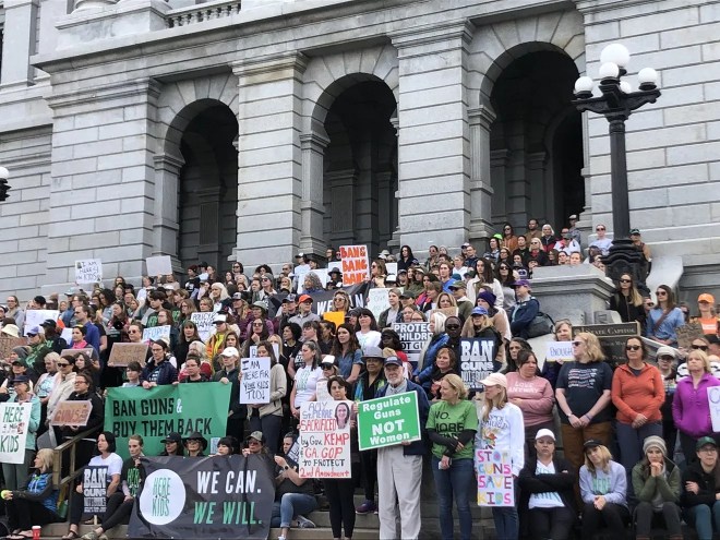 Here4TheKids protesters stand on the steps of Colorado State Capitol on June 5.